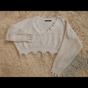 Cropped distressed sweater